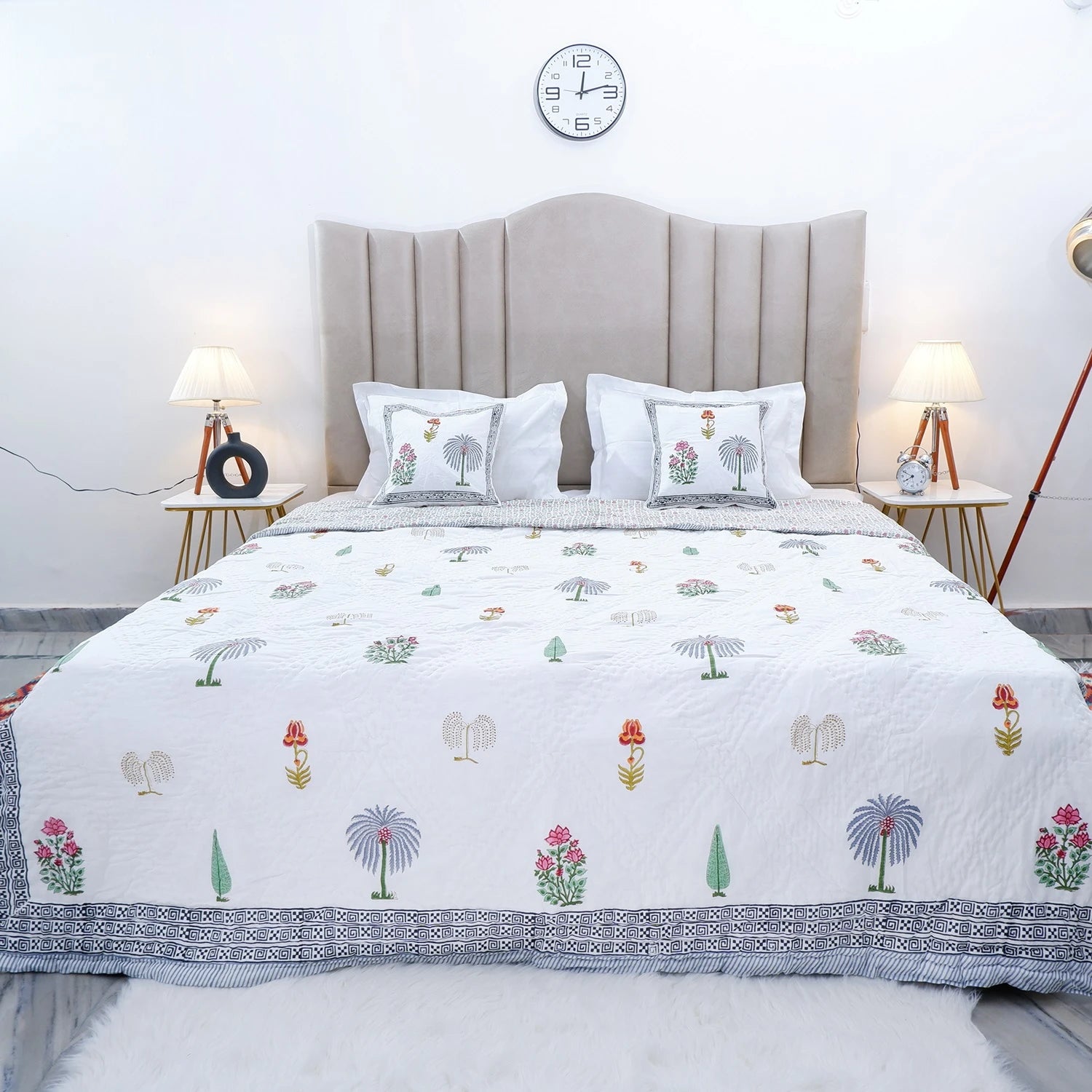 Colorful floral design on 100% cotton double bed quilt from The Jaipuri, enhancing bedroom decor