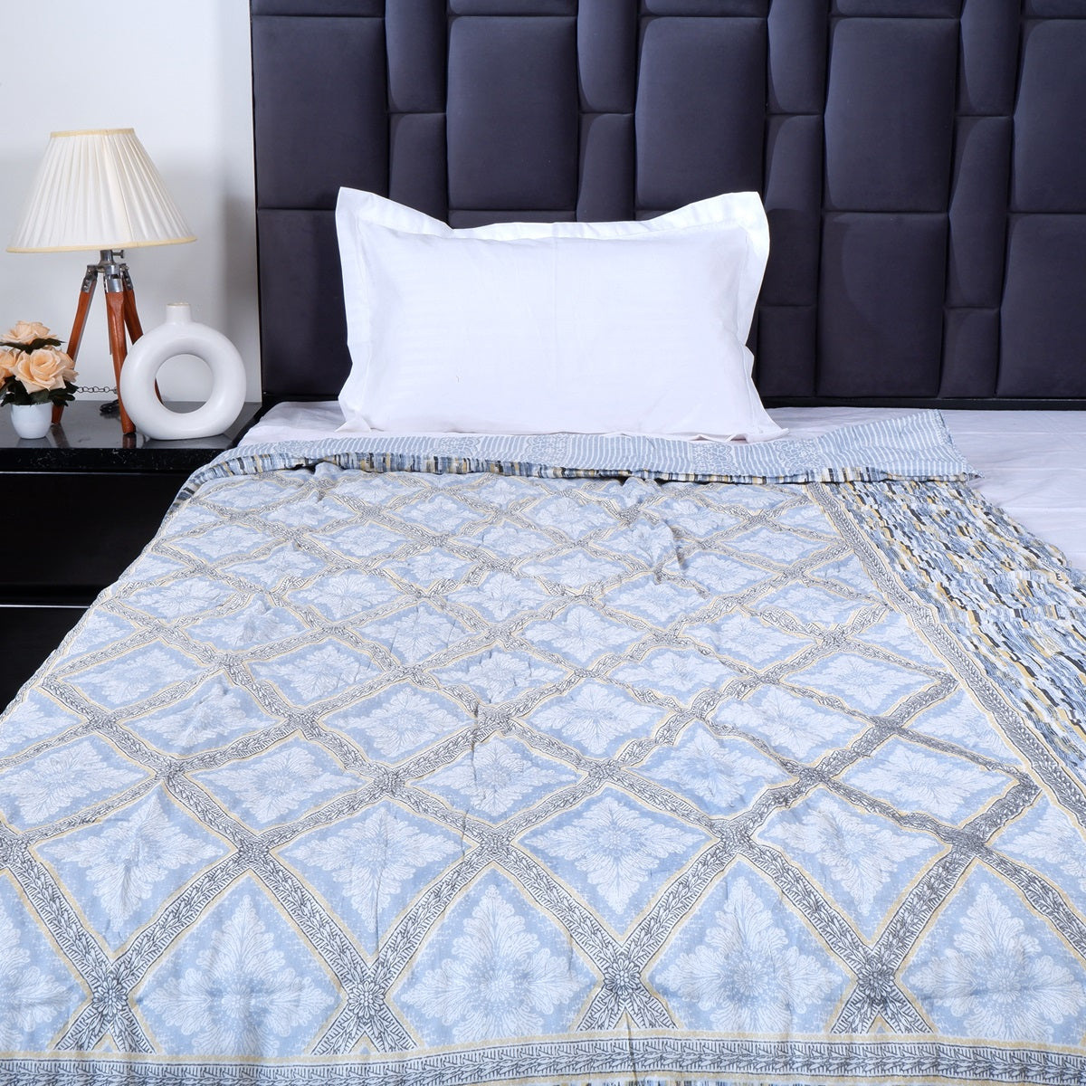 The Jaipuri 100% cotton single bed quilt in elegant blue pattern, perfect for stylish bedroom decor