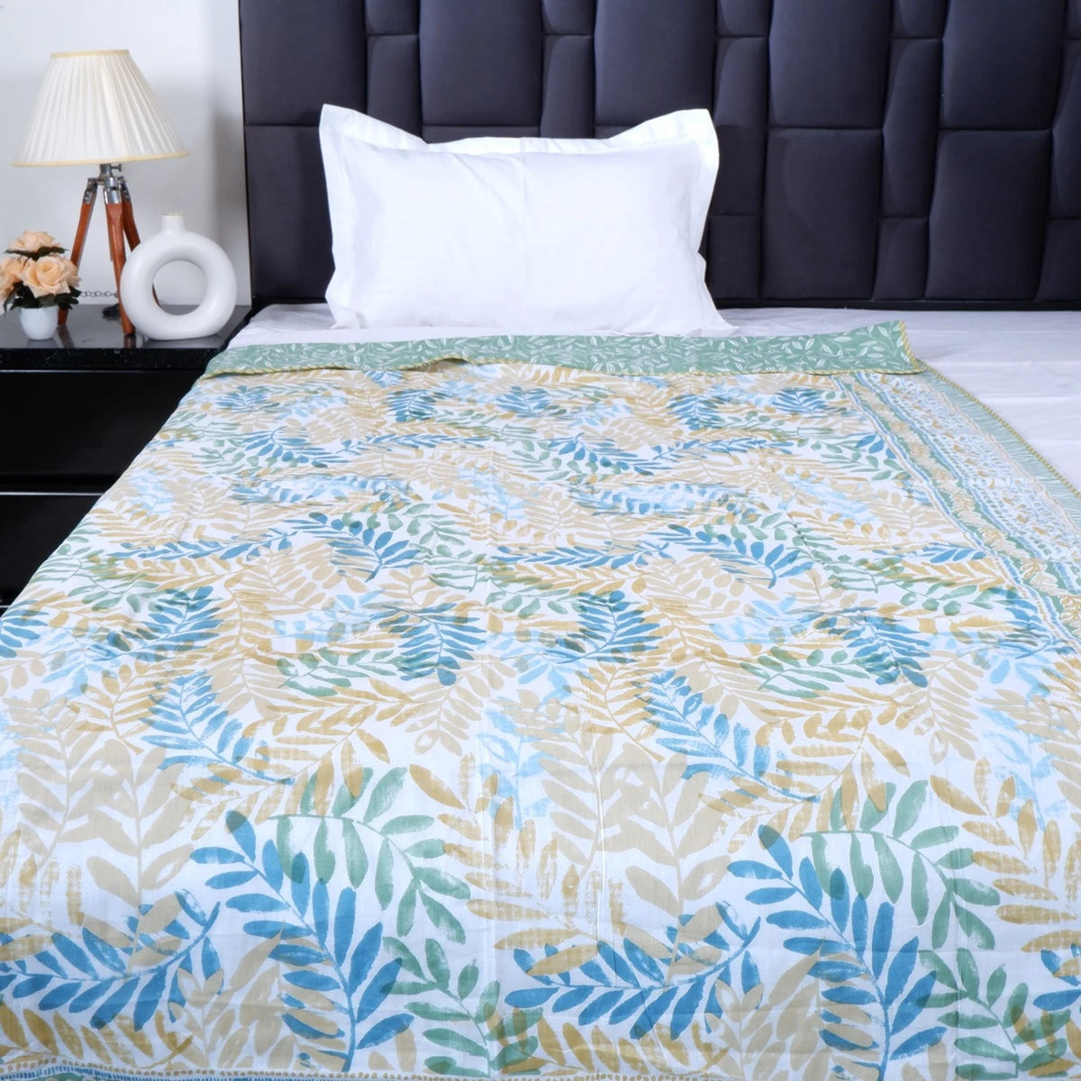 Elegant Jaipuri 100 percent mulmul cotton blanket with colorful leaf patterns for a cozy bedroom décor