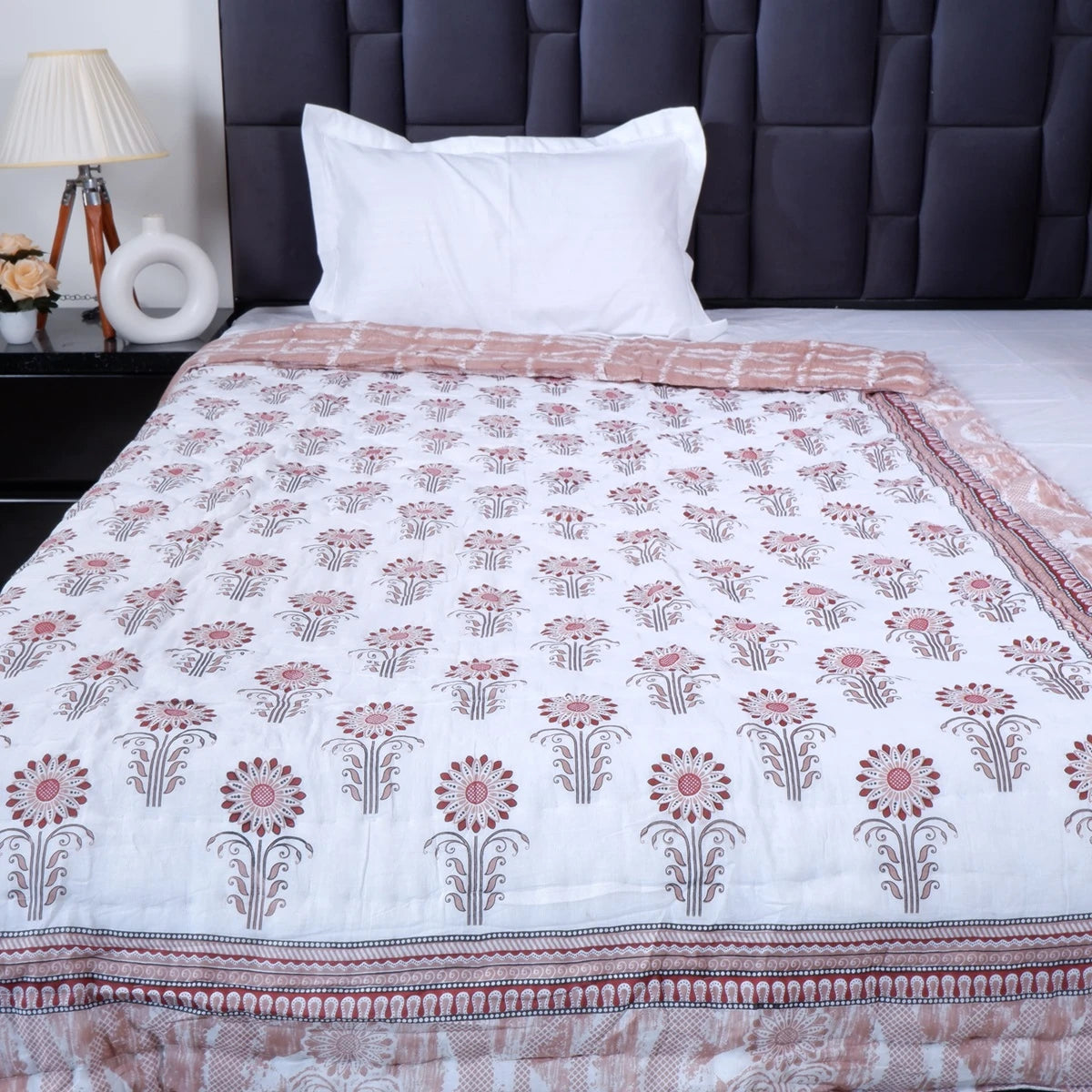 100% pure cotton quilt Jaipur featuring floral patterns in soft pastel colors for cozy bedding