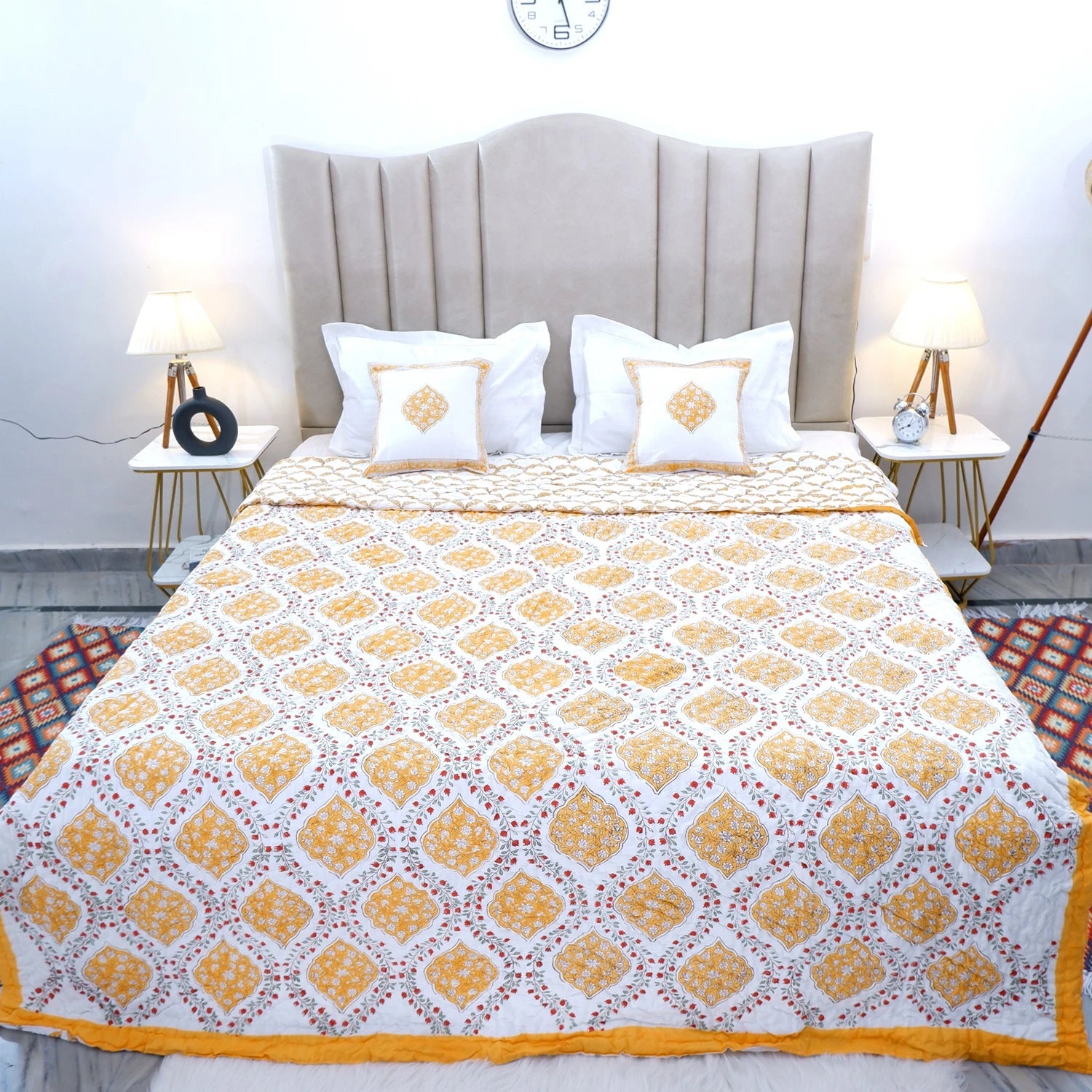 Yellow and white block print cotton quilt for double bed with decorative patterns and matching pillow covers