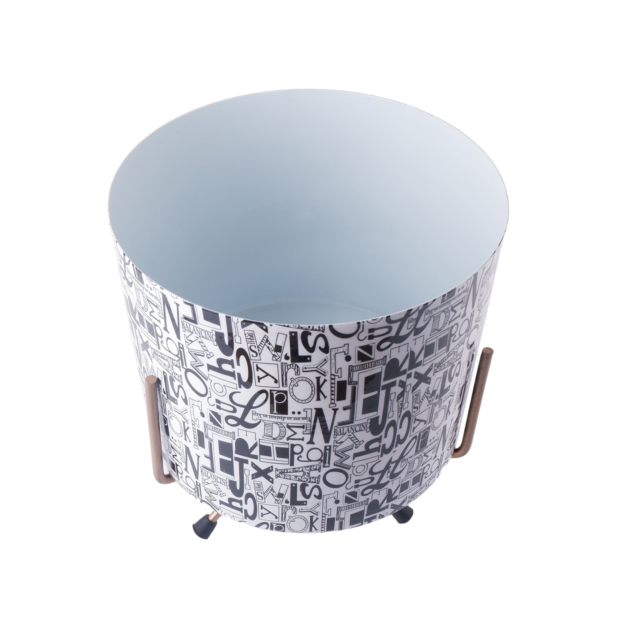 Designer metal flower pot with a stylish abstract print and sturdy metal legs for modern decor