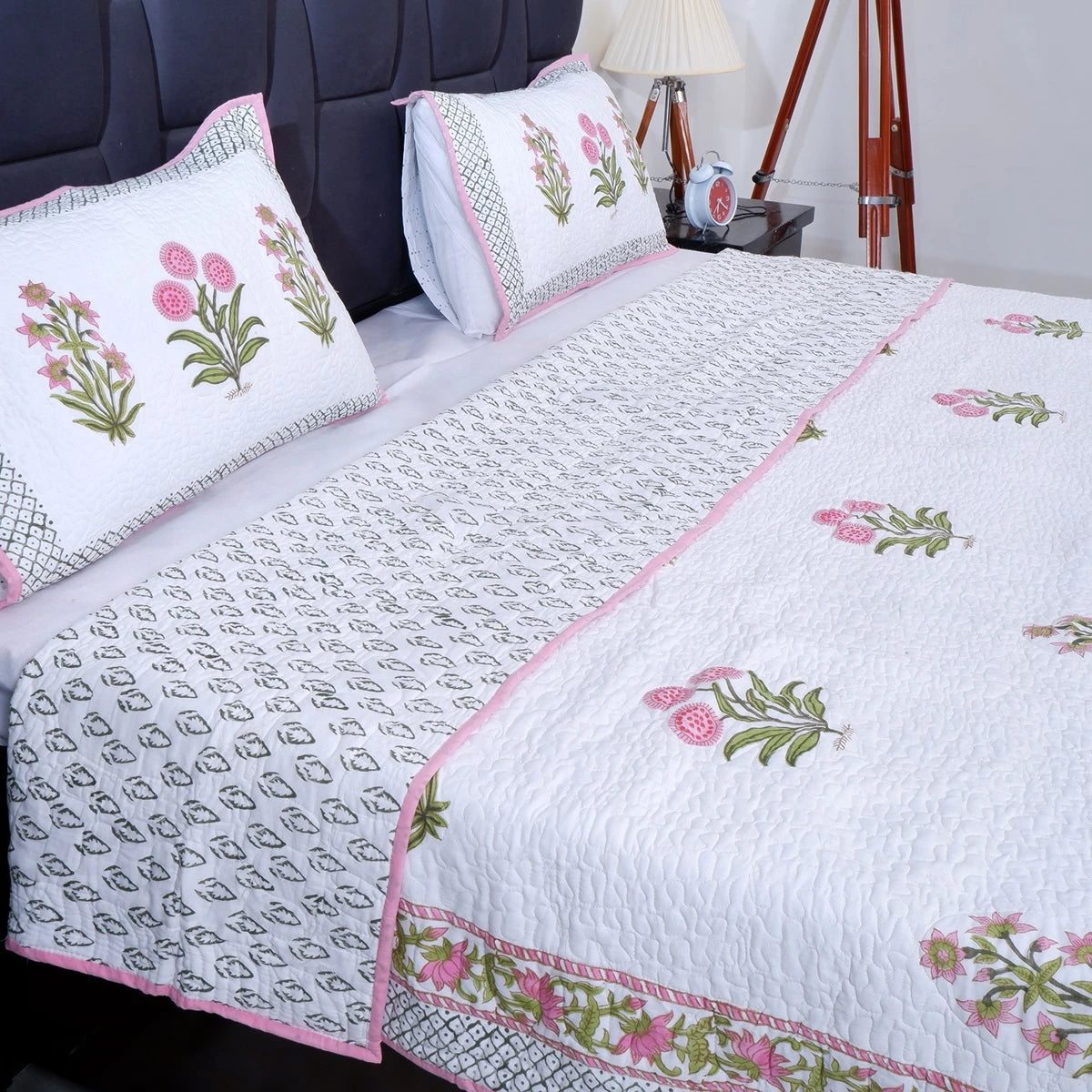 Hand block print cotton bedcover in floral design with matching pillows for stylish bedroom decor