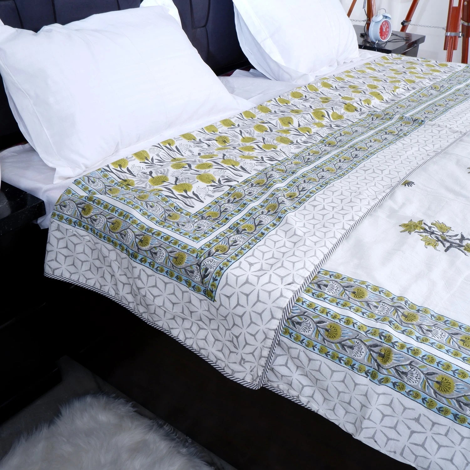 Hand block print mulmul dohar in green and white floral design, perfect for cozy bedding.