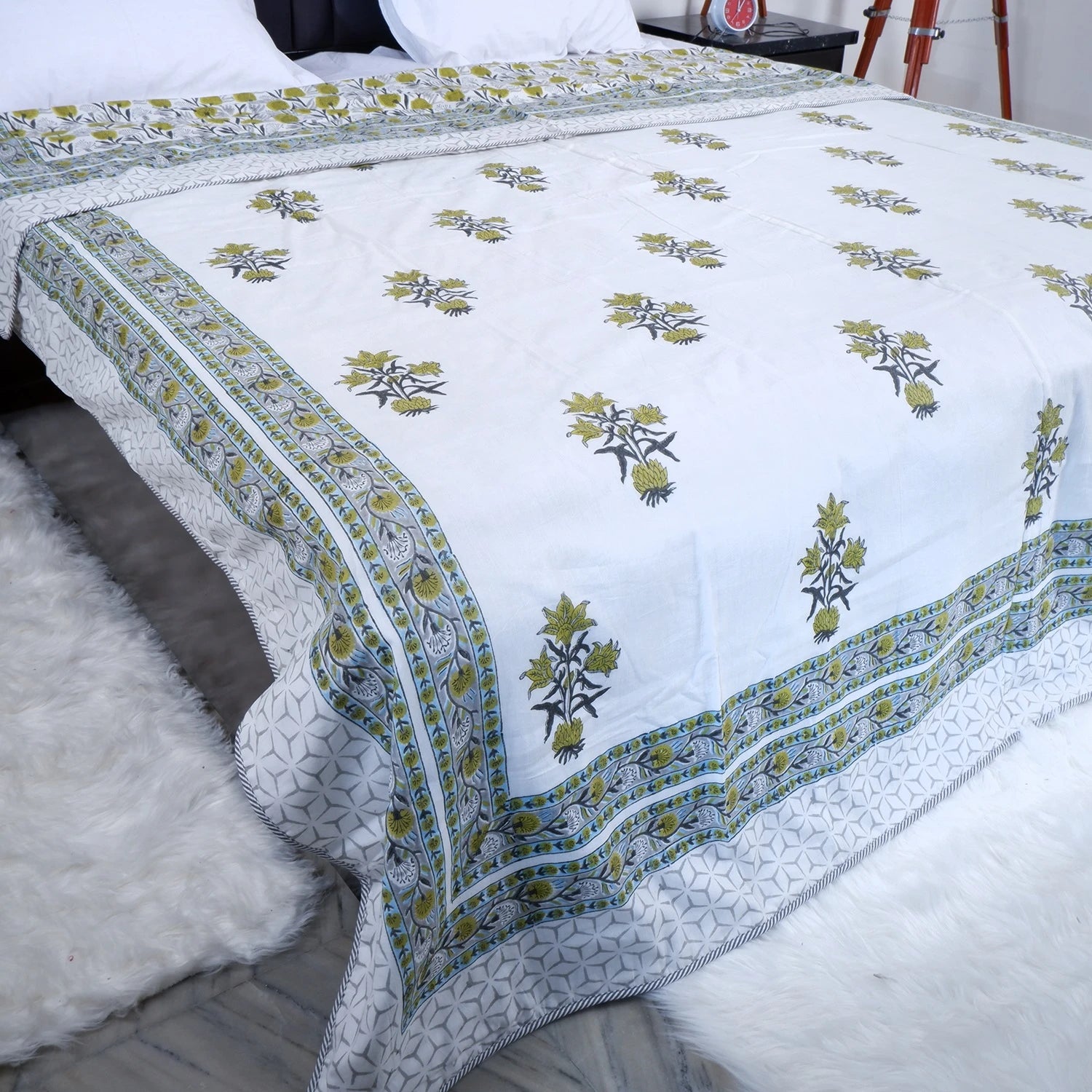 Hand block print mulmul dohar in white with green floral design, perfect for bedroom decor