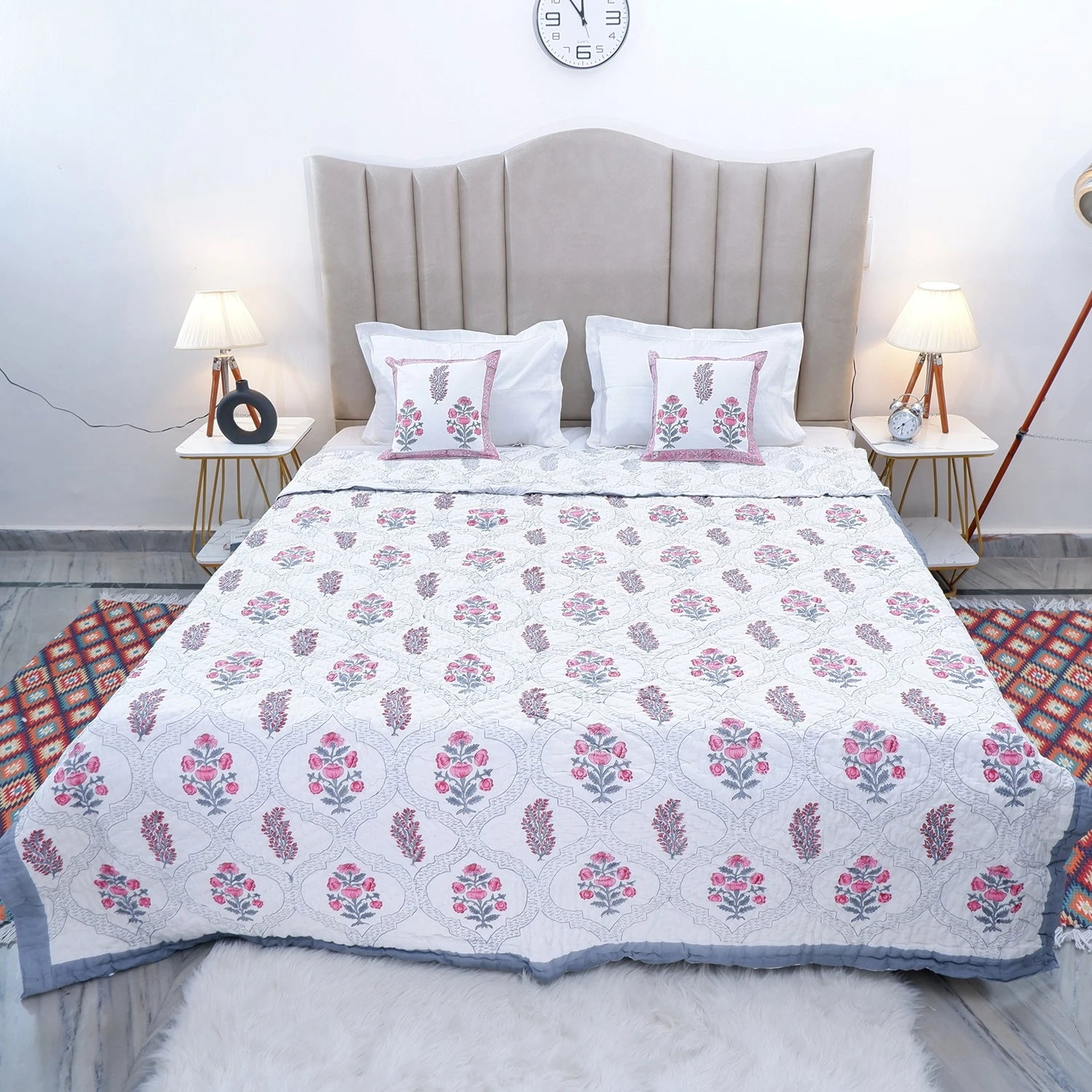 Handcrafted Jaipur quilts for bedroom featuring floral patterns and an elegant design