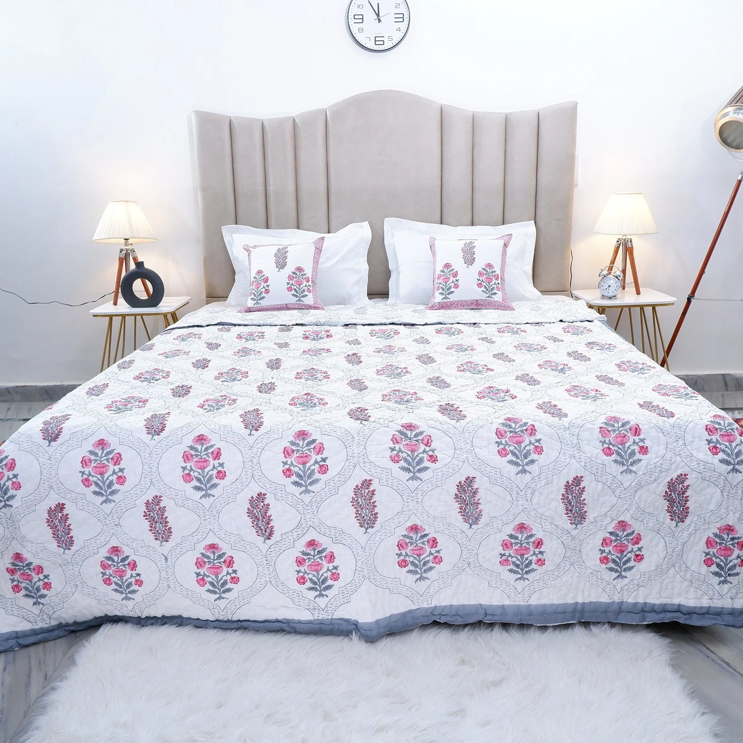 Handcrafted Jaipur quilts for bedroom featuring floral designs and a soft, elegant finish