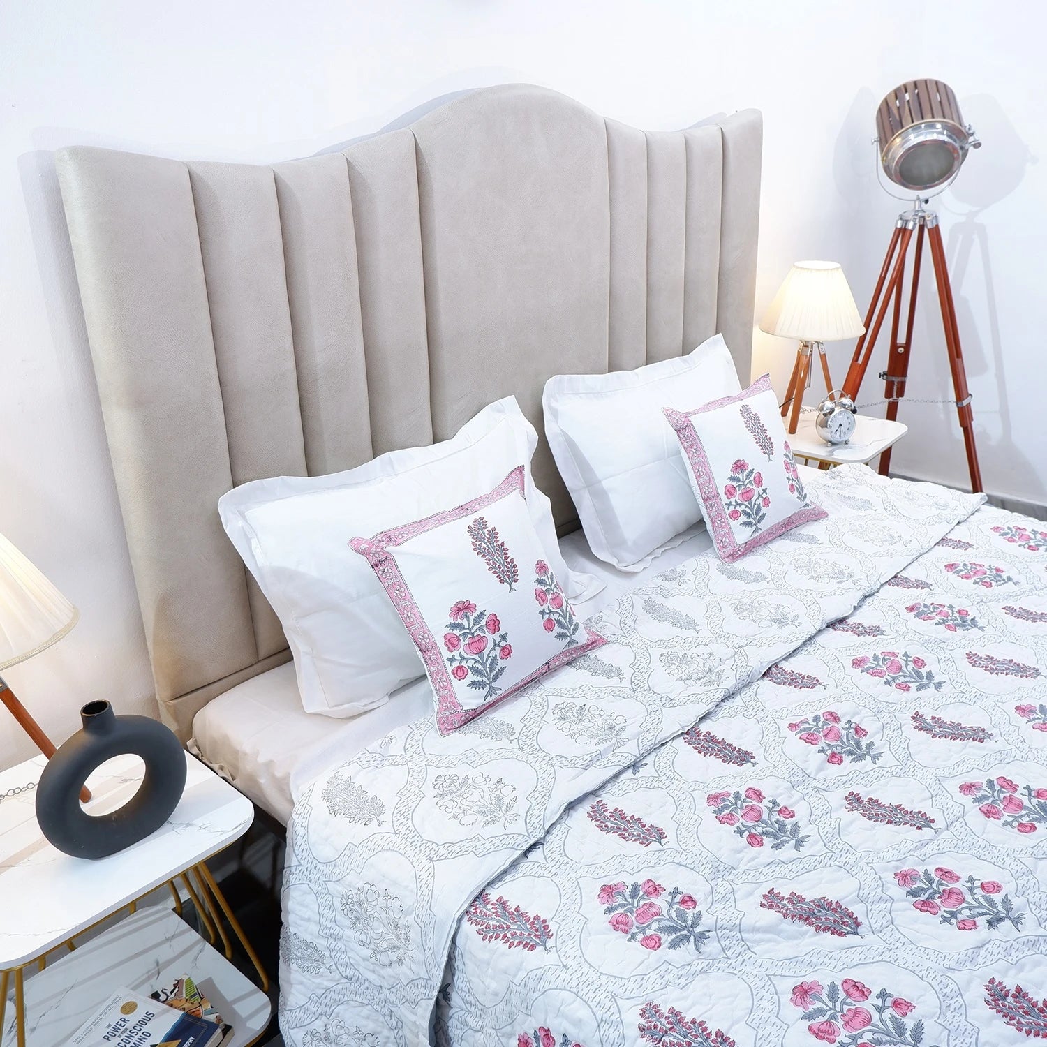 Handcrafted Jaipur quilts for bedroom with floral patterns on an elegant bed setup