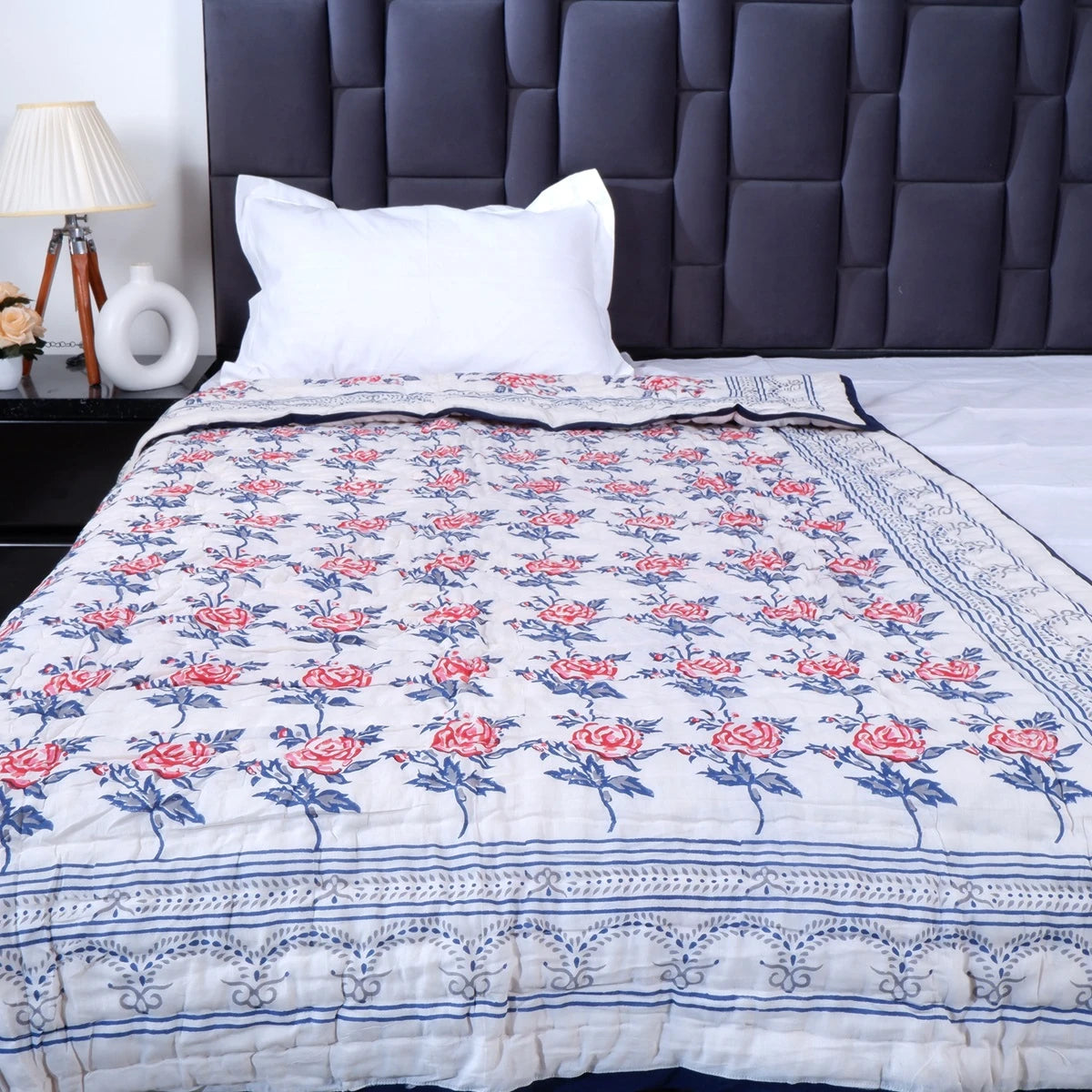 Elegant handcrafted Jaipuri bedding online with floral design on a soft quilt