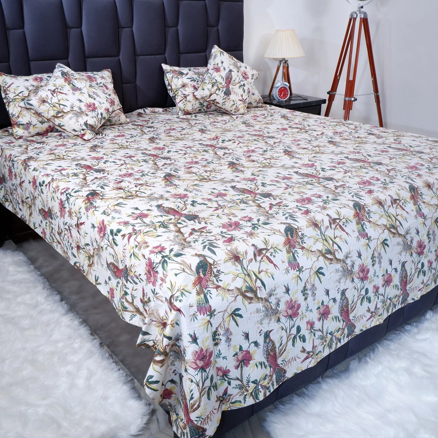 Jaipur cotton bed sheet featuring vibrant floral and bird patterns for elegant bedroom decor