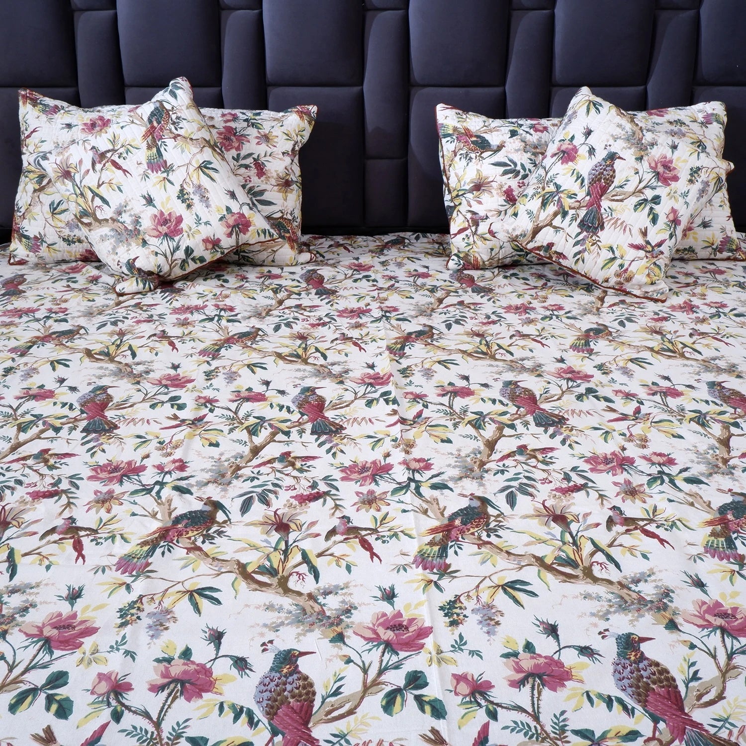 Jaipur cotton bed sheet featuring colorful floral and bird patterns, enhancing bedroom decor