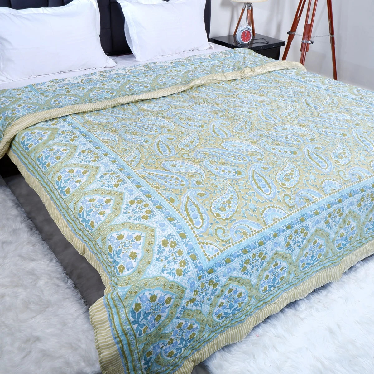 Jaipuri block print comforter for winter in light green and blue with intricate paisley design