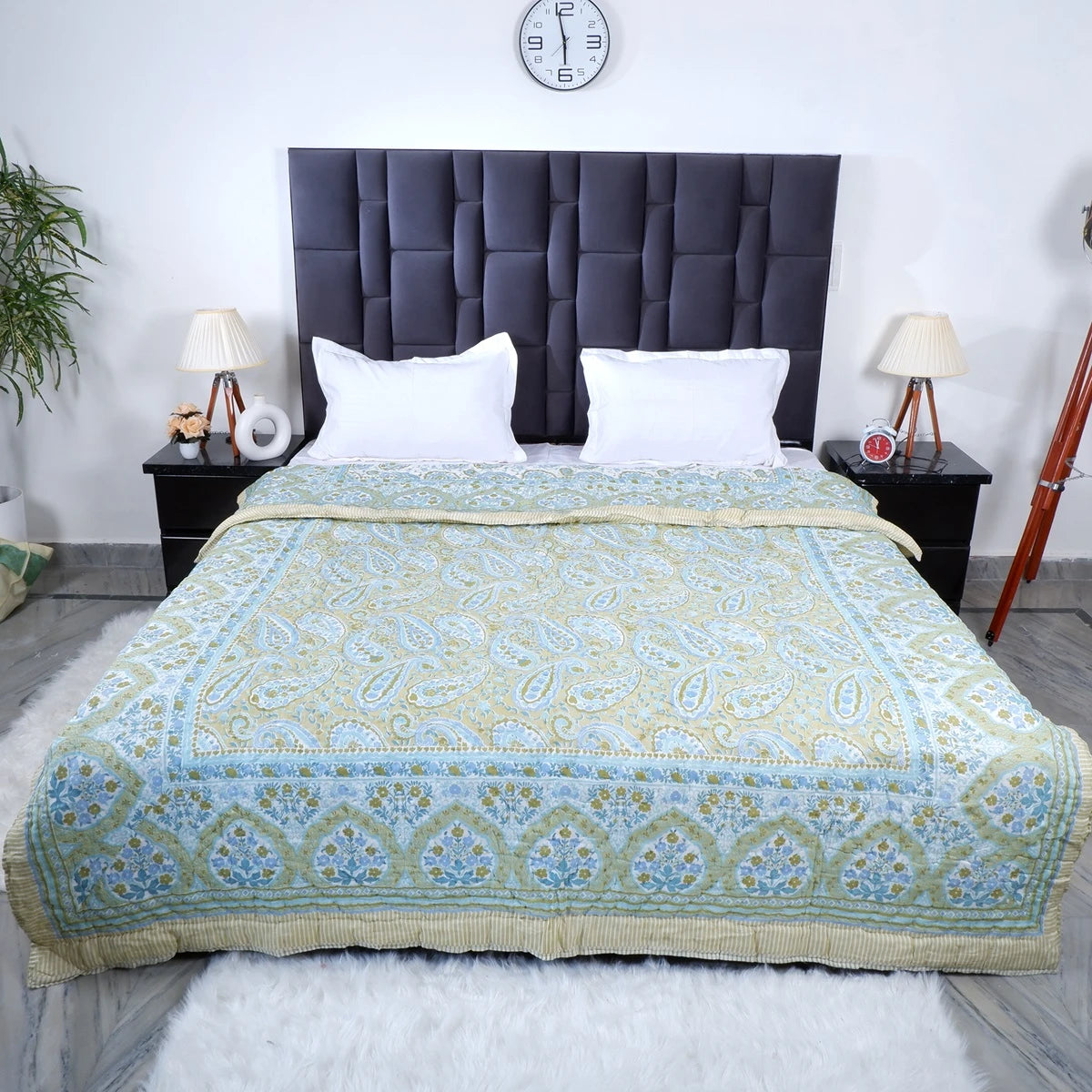 Jaipuri block print comforter for winter featuring intricate paisley designs in soft blue and green hues