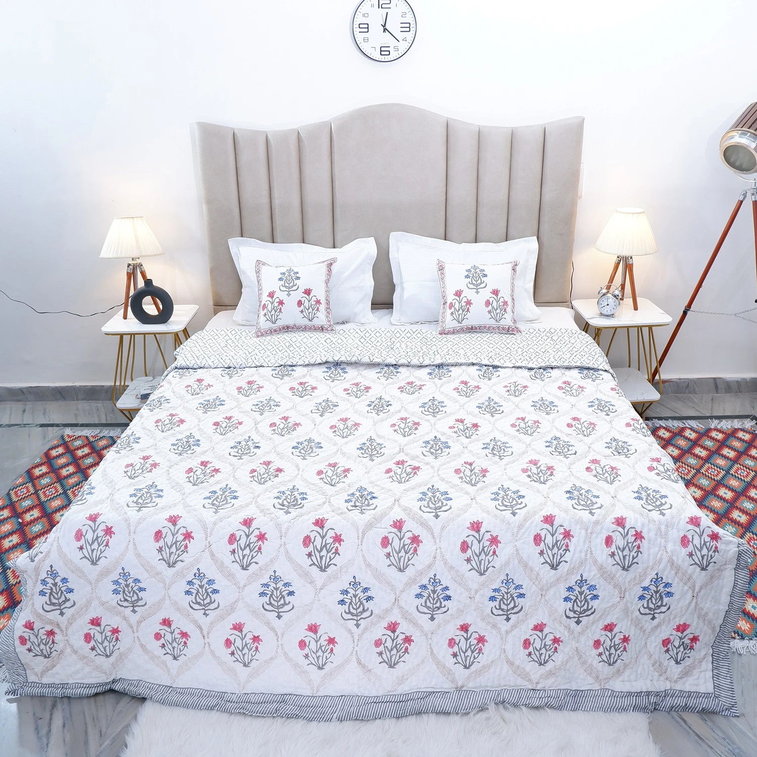 Jaipuri block print quilts with floral patterns in soft colors, perfect for cozy bedroom decor