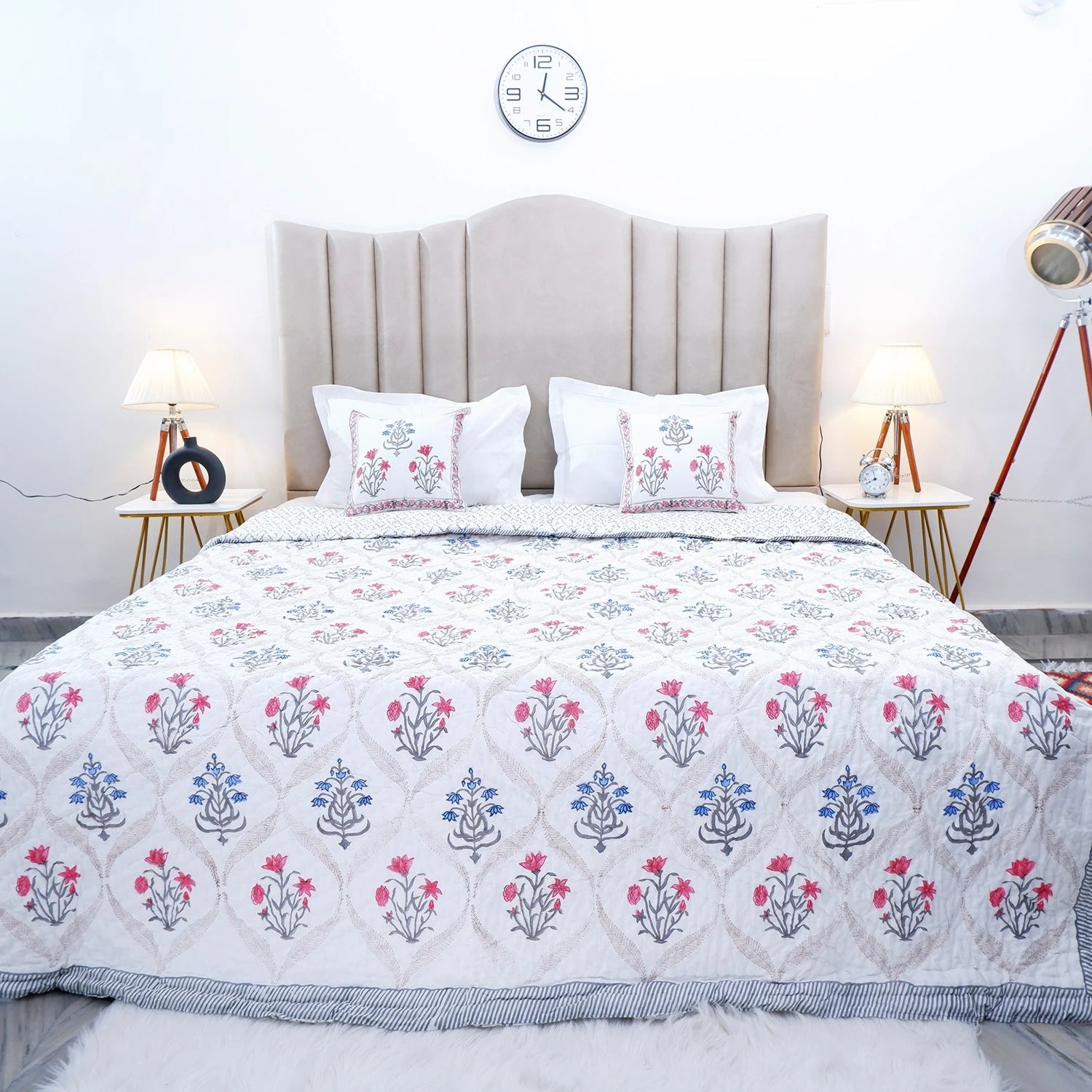 Jaipuri block print quilts in floral design, enhancing bedroom decor with elegance
