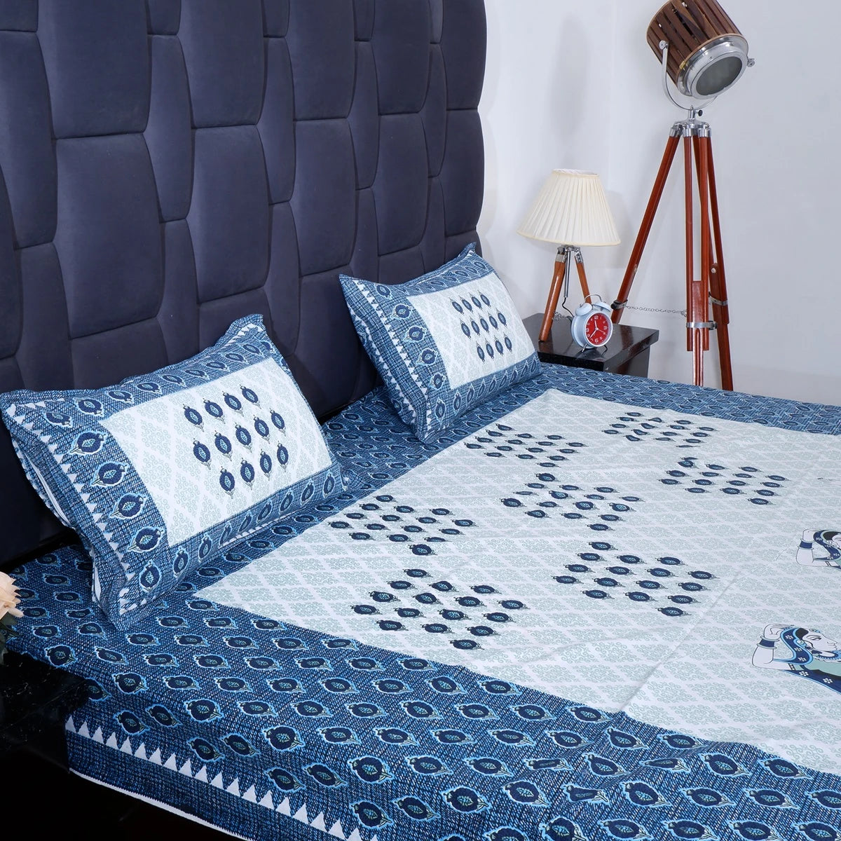 Jaipuri cotton bed sheet featuring a blue and white geometric pattern with matching pillow covers
