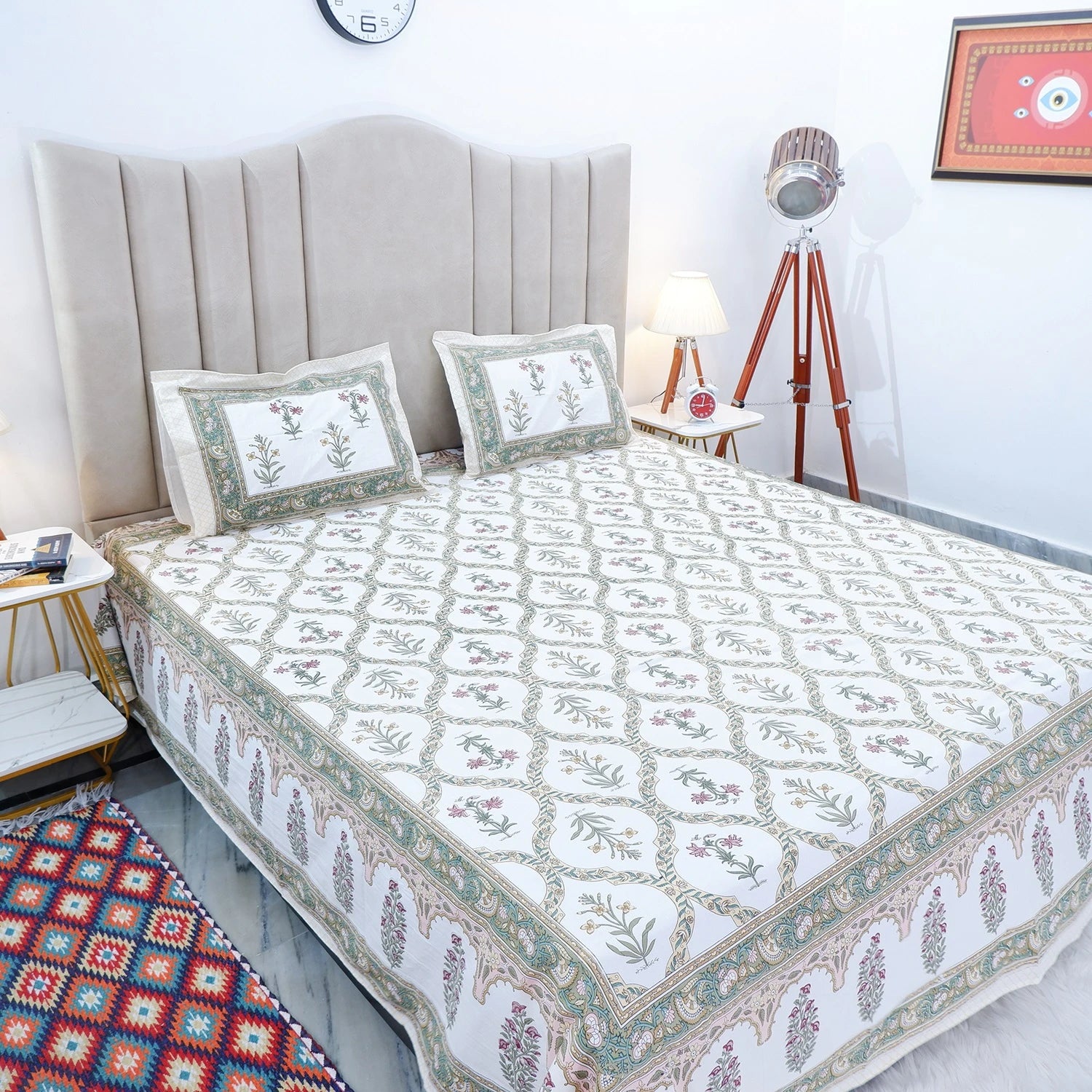 Elegant Jaipuri cotton bed sheet with floral patterns and matching pillows for a cozy bedroom