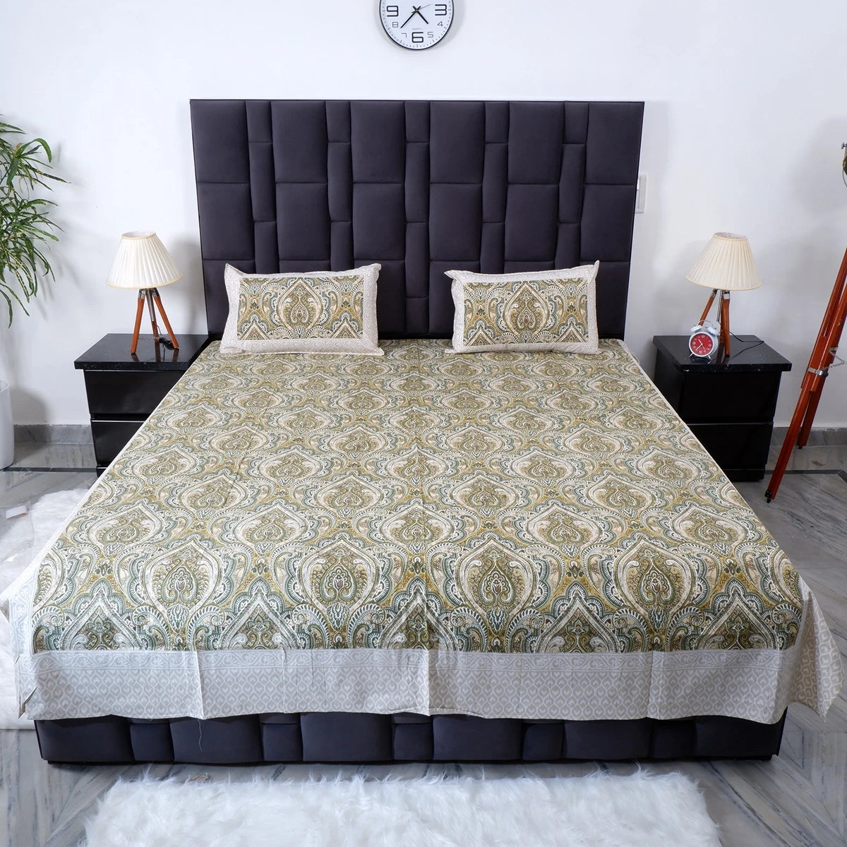 Jaipuri cotton bed sheet in green and cream paisley design, paired with coordinating pillow covers
