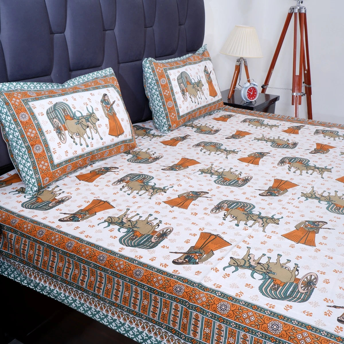 Jaipuri cotton bed sheet featuring vibrant traditional prints with matching pillows for an elegant bedroom look.