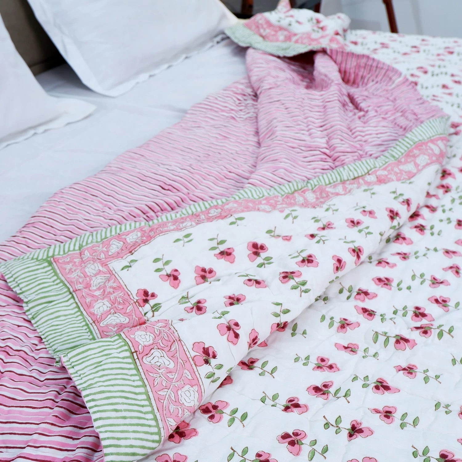 Jaipuri cotton quilt double bed with floral designs and striped pattern, perfect for stylish home decor