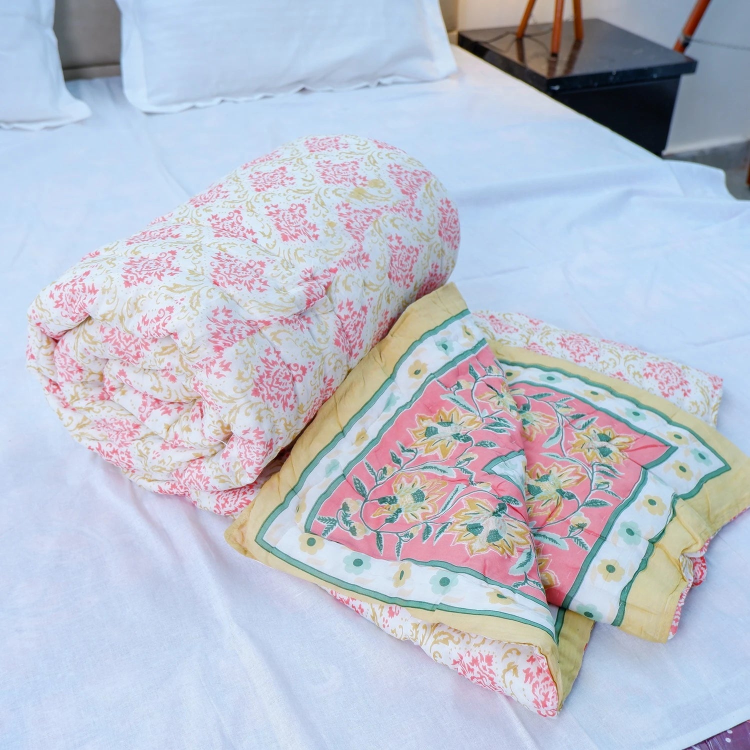 Jaipuri cotton quilt double bed in pink and yellow floral pattern, perfect for cozy bedroom decor