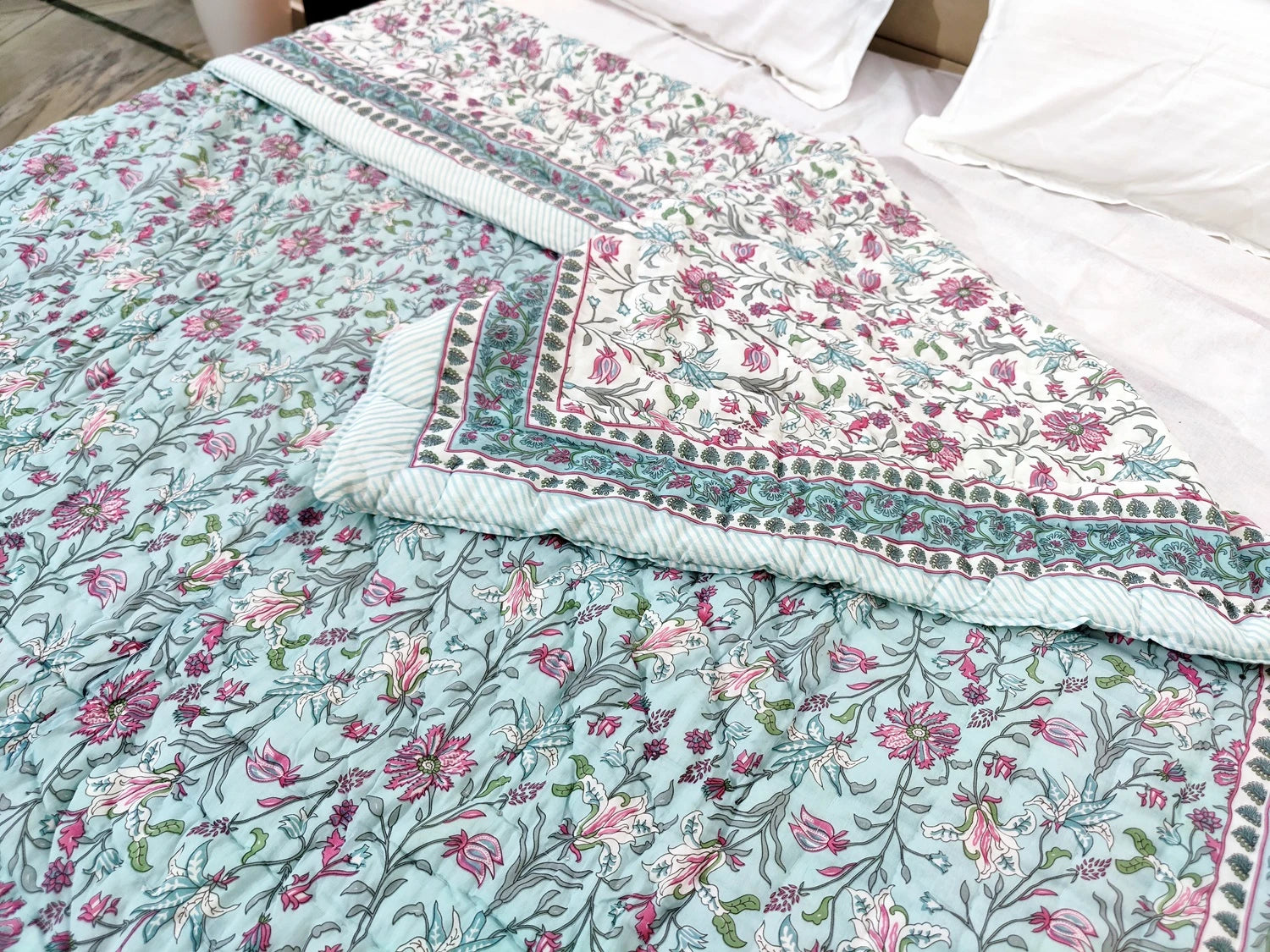 Jaipuri cotton quilt double bed in floral pattern featuring vibrant colors and intricate designs