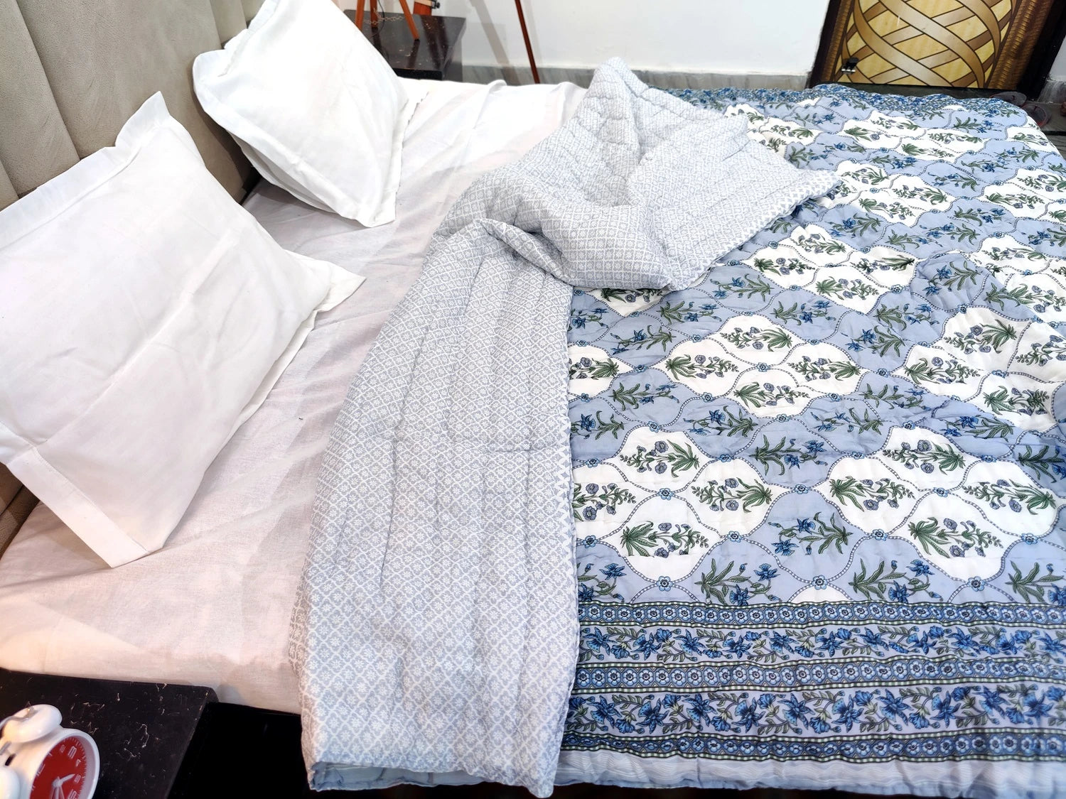 Jaipuri cotton quilt double bed on a neatly made bed with white pillows and stylish decor