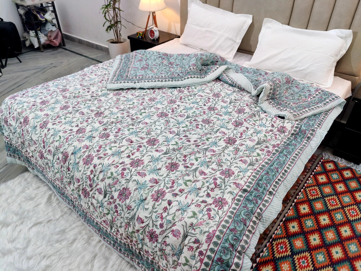 Jaipuri cotton quilt double bed featuring a floral design and soft, breathable fabric