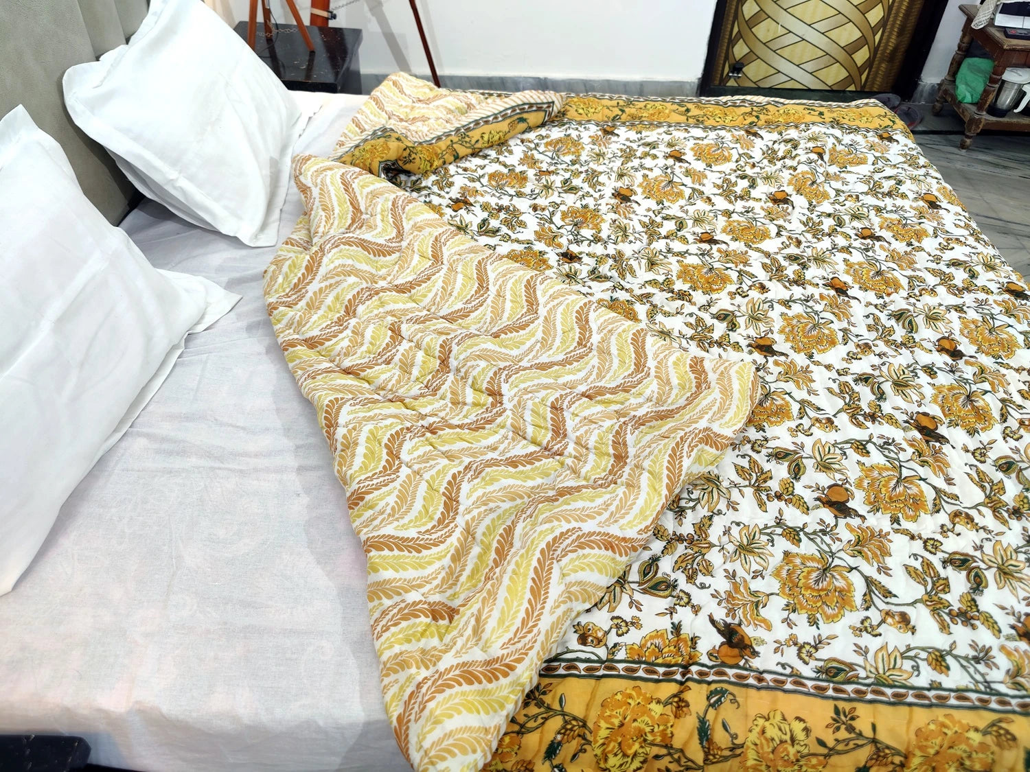 Jaipuri cotton quilt double bed featuring intricate floral patterns in vibrant colors