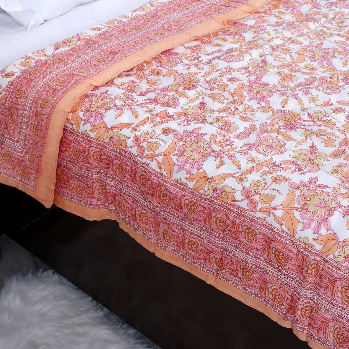 Jaipuri cotton quilt single bed with floral design and vibrant border for cozy bedding