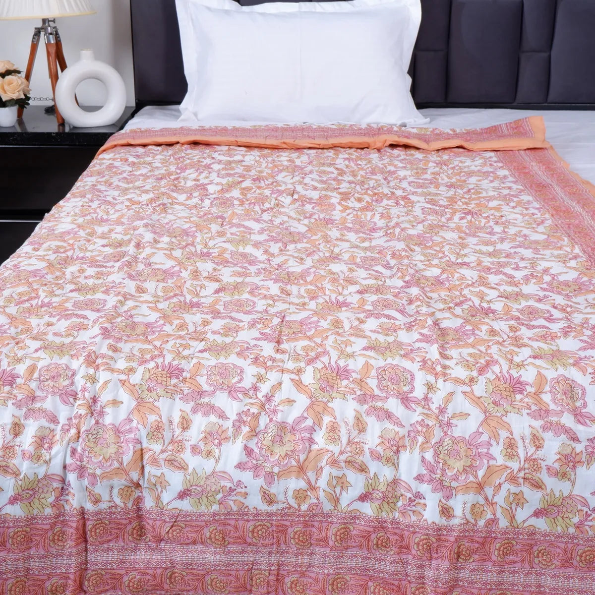 Jaipuri cotton quilt single bed with floral design in soft pastel colors for elegant bedroom decor