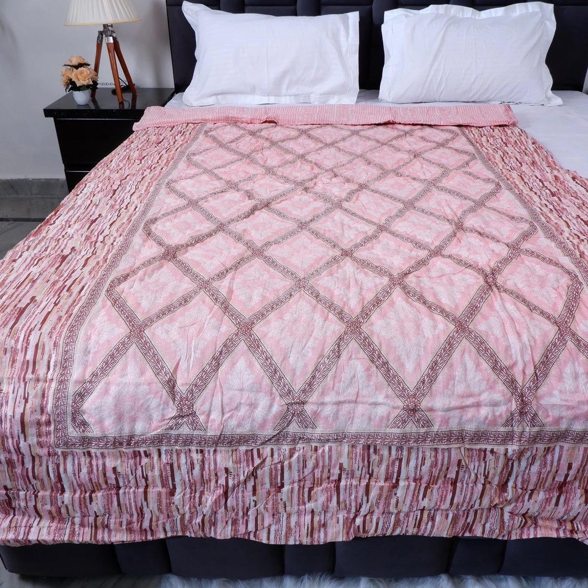 Jaipuri cotton quilt single bed in pink with intricate geometric patterns and soft texture