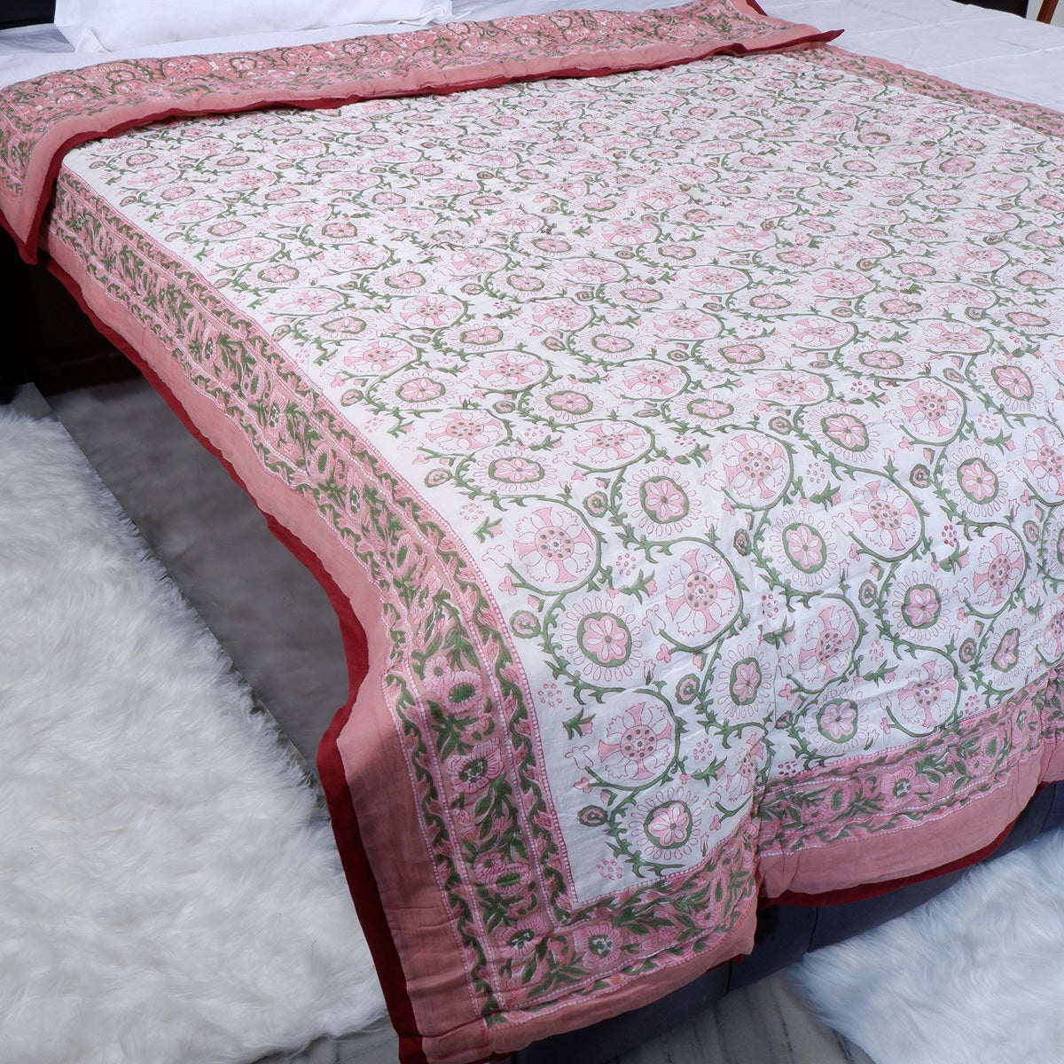 Jaipuri pure cotton quilt single bed with intricate floral patterns in soft pink and green hues