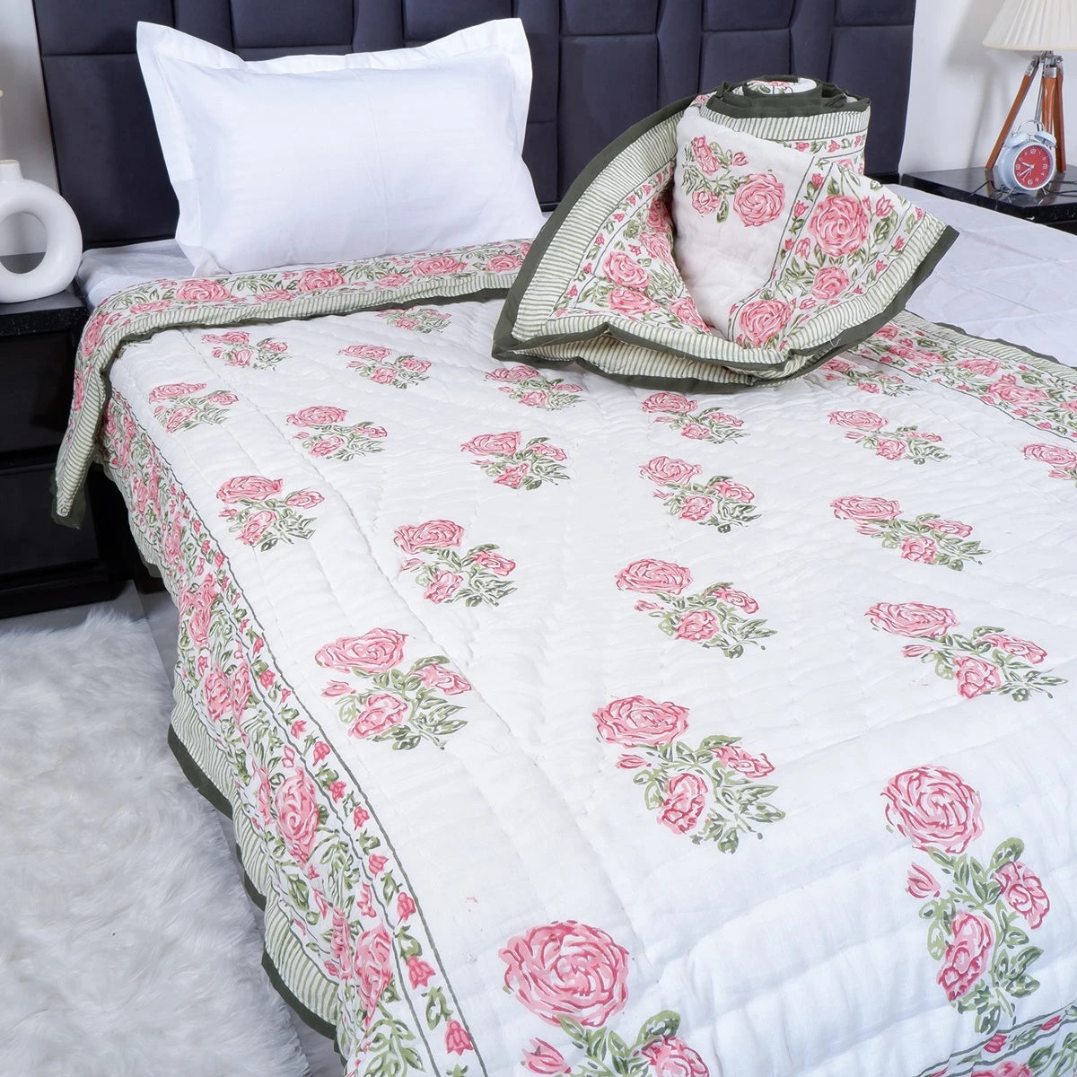 Jaipuri quilt single bed with floral design in pink and green, perfect for cozy bedroom decor