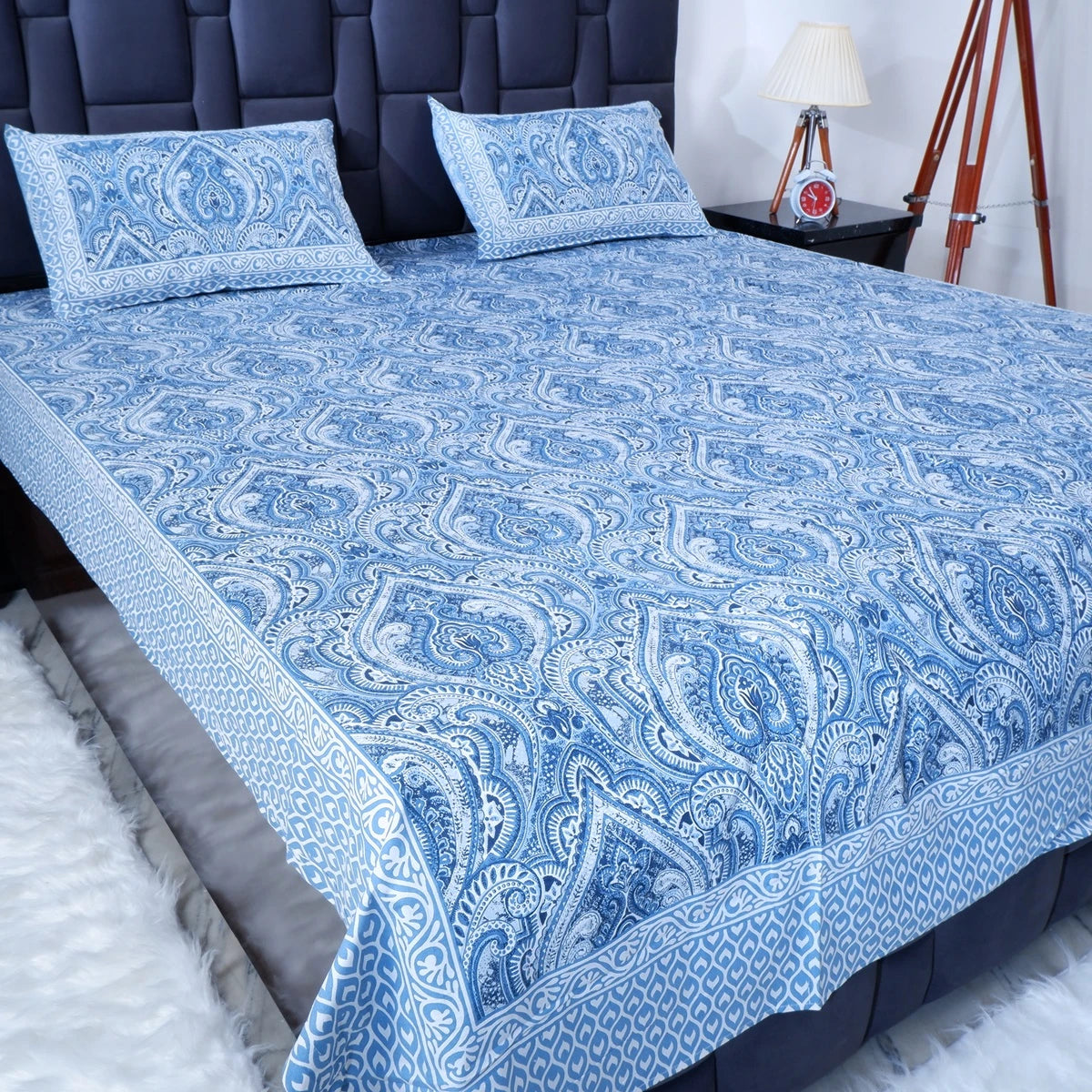 The Jaipuri pure cotton bed sheet in blue paisley design with matching pillow covers for stylish bedding