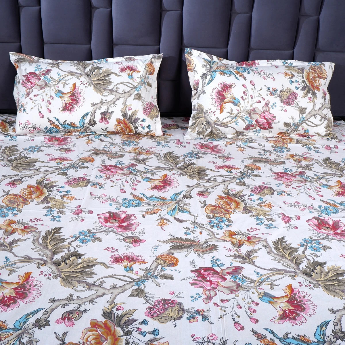 The Jaipuri pure cotton bed sheet with floral design and matching pillow covers for a stylish bedroom
