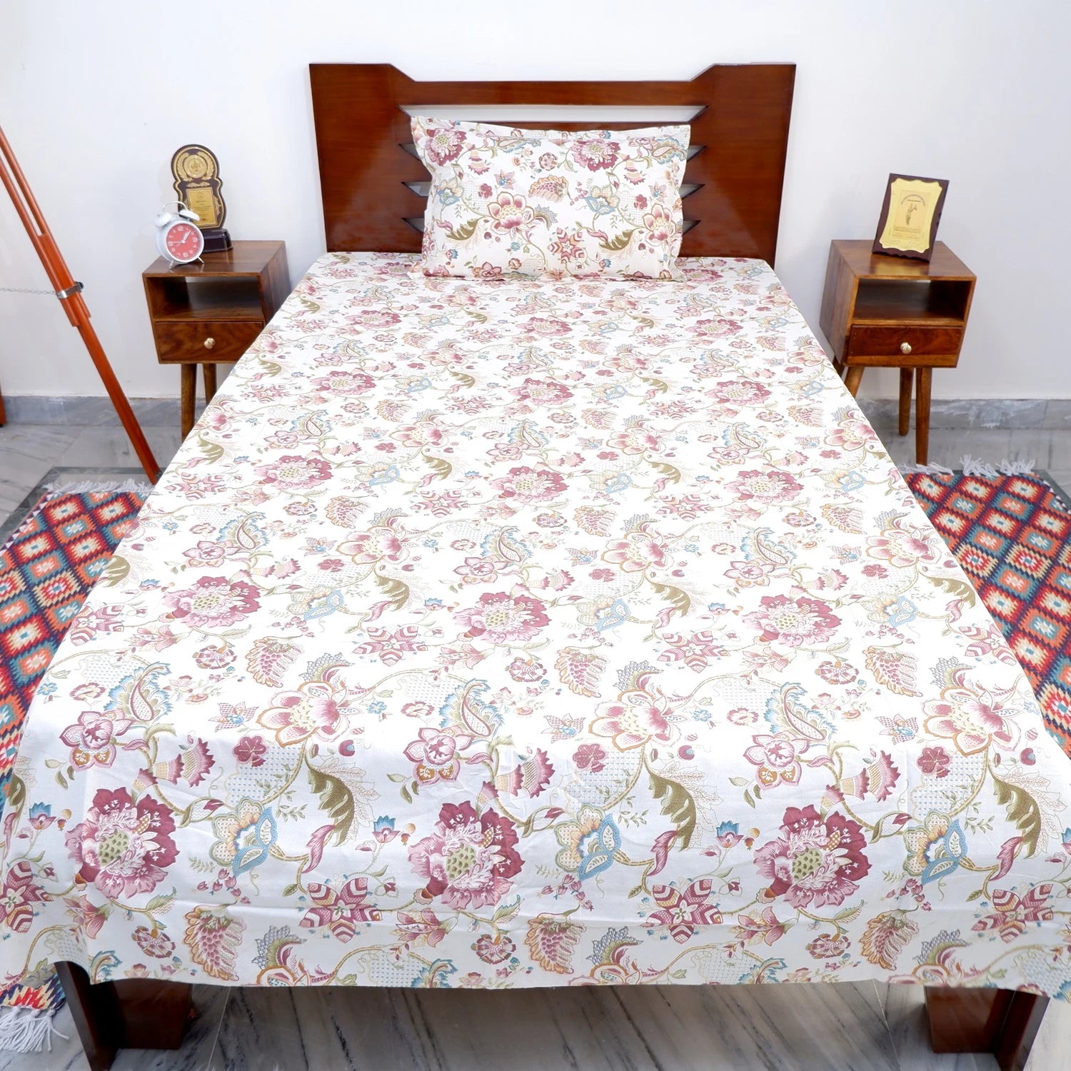 The Jaipuri pure cotton bed sheet with floral patterns for a stylish bedroom aesthetic