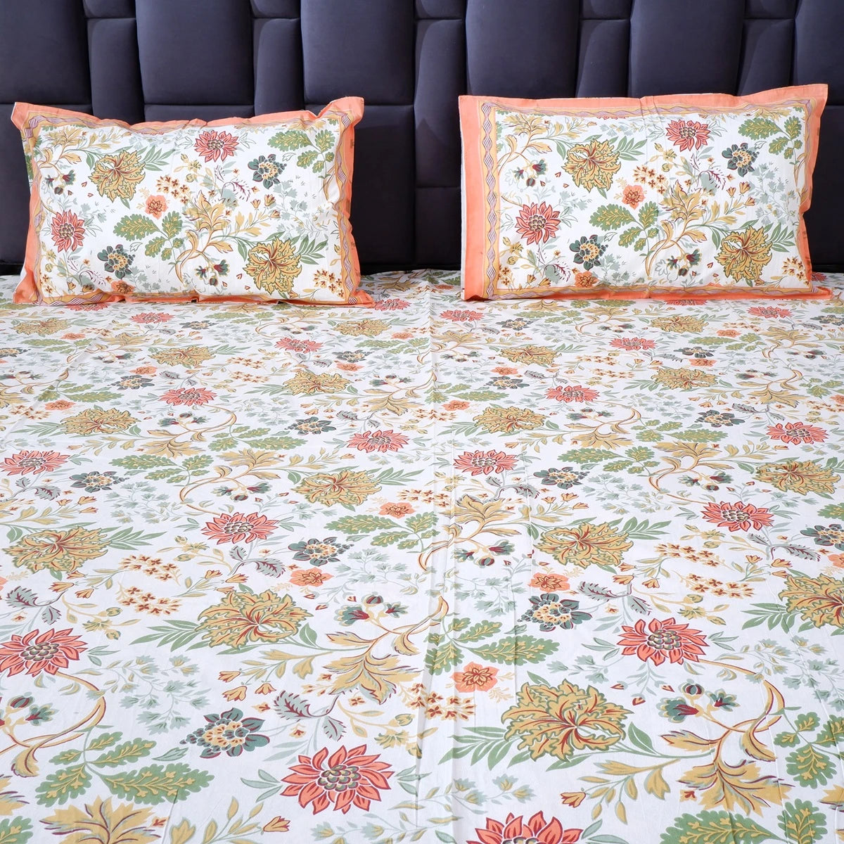 The Jaipuri pure cotton bed sheet with floral pattern and matching pillow covers for a vibrant bedroom look