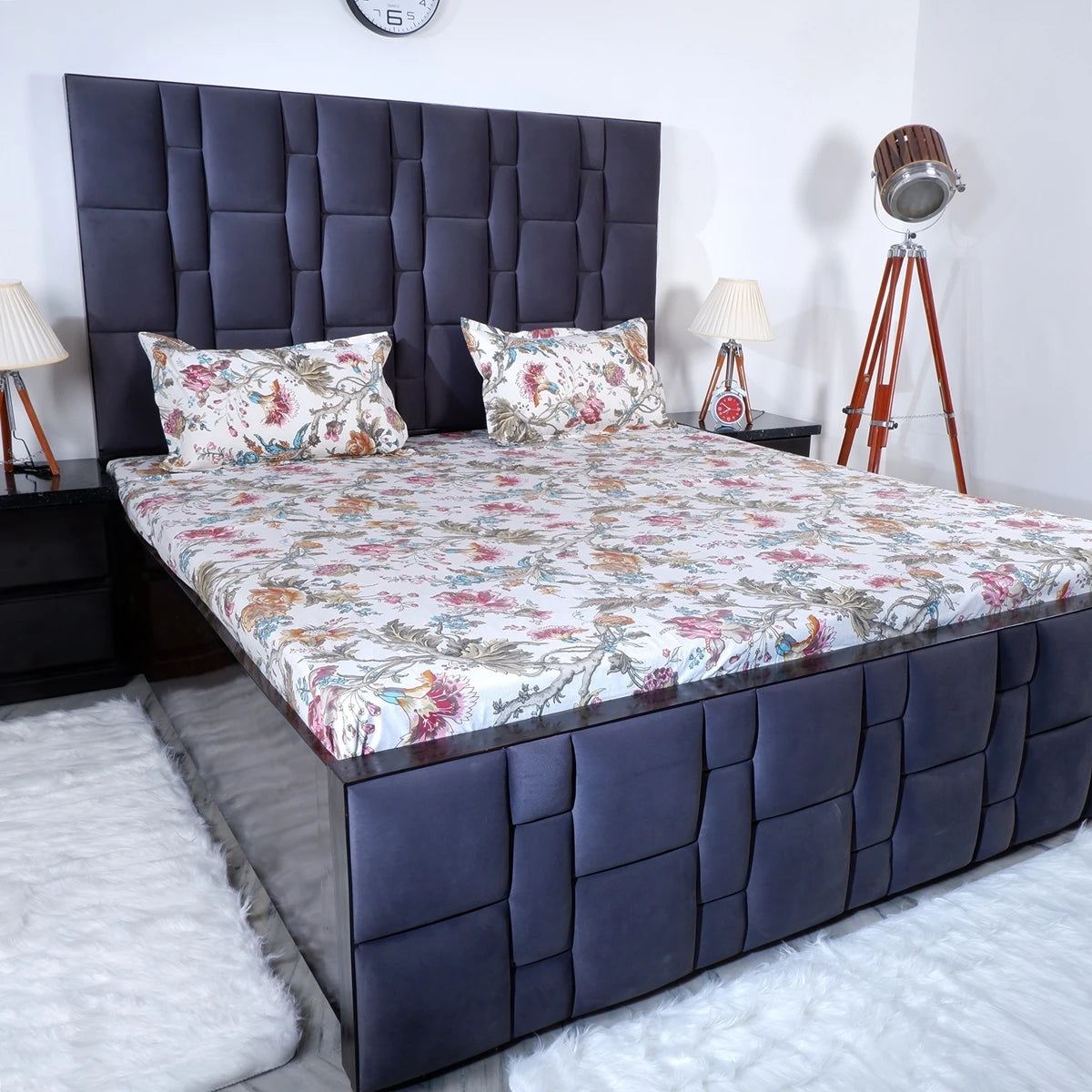 The Jaipuri pure cotton bed sheet featuring floral design on a stylish gray bed
