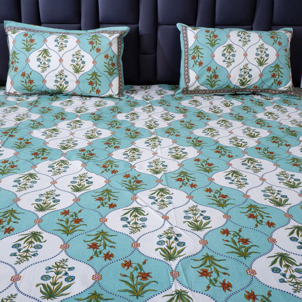 Vibrant pure cotton bed sheet Jaipur with intricate floral patterns and coordinating pillow covers