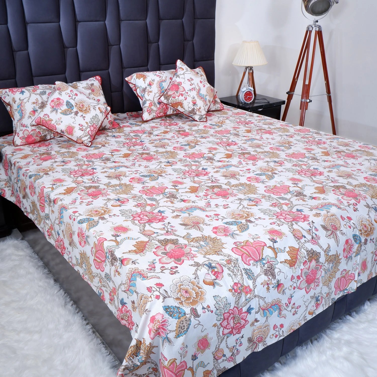 The Jaipuri pure cotton bed sheet Jaipur with floral pattern and matching pillow covers for a vibrant bedroom look