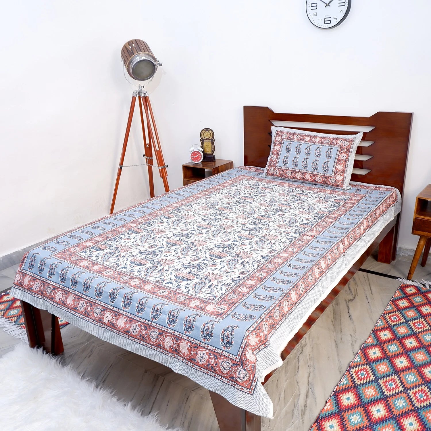 Jaipuri pure cotton bed sheet online featuring intricate traditional patterns in blue and red
