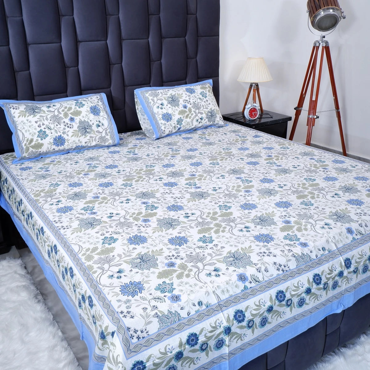 The Jaipuri pure cotton bed sheet set with floral design in blue and white for comfortable bedding